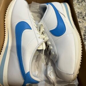 Nike Cortez shoes. Women’s size 7.5. Light blue swoosh.
